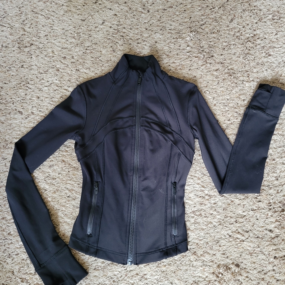 Lululemon Athletica Black Utility Jacket with High Collar and Streamlined Design